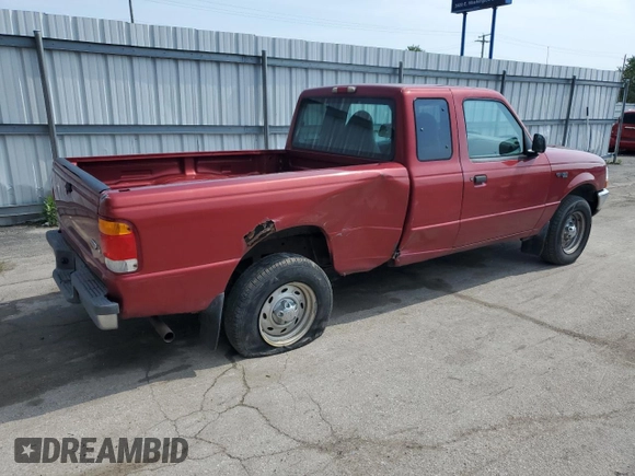 1999 Ford Ranger XL with VIN 1FTYR14V2XPB56627, listed as a Copart auction lot 57036435 with 215,050 mi miles and Salvage title. Bid and sale history available at DreamBid. Image 3.