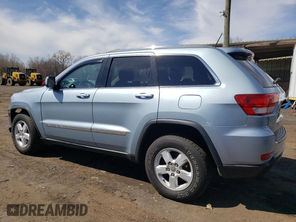 2012 Jeep Grand Cherokee Laredo with VIN 1C4RJFAG5CC222569, listed as a Copart auction lot 53264185 with 153,921 mi miles and Salvage Title. Bid and sale history available at carsss.com. Image 2.