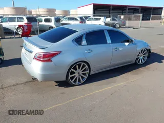 2014 Nissan Altima S with VIN 1N4AL3AP8EN343583, listed as a IAAI auction lot 41989981 with 103,012 mi miles and . Bid and sale history available at DreamBid. Image 4.
