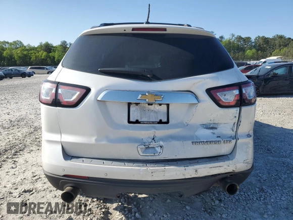 2016 Chevrolet Traverse LTZ z VIN 1GNKRJKD9GJ287581, wystawiony jako Copart lot #52200875 z przebiegiem 97 425 mil mil oraz Szkoda całkowita • Salvage title. Historia ofert i sprzedaży dostępna na DreamBid. Obrazek 6.