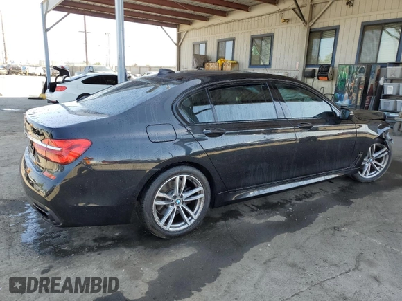 2016 BMW 7 Series 740i with VIN WBA7E2C55GG547282, listed as a Copart auction lot 57740095 with Not provided miles and Salvage title. Bid and sale history available at DreamBid. Image 3.
