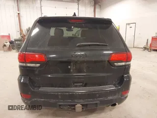 2018 Jeep Grand Cherokee Laredo E with VIN 1C4RJFAG5JC417701, listed as a IAAI auction lot 42001159 with 110,767 mi miles and . Bid and sale history available at DreamBid. Image 16.