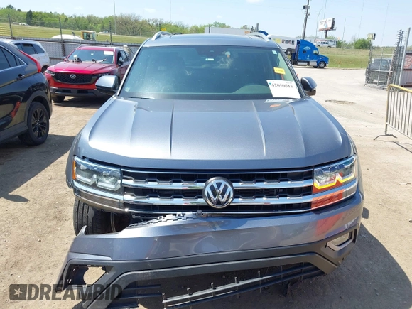 2019 Volkswagen Atlas SEL z VIN 1V2ER2CA5KC555568, wystawiony jako IAAI lot #42050516 z przebiegiem 71 599 mil mil oraz . Historia ofert i sprzedaży dostępna na DreamBid. Obrazek 12.
