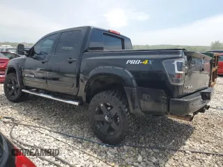 2015 Nissan Titan SL with VIN 1N6AA0EC4FN511210, listed as a Copart auction lot 58762265 with 89,561 mi miles and Clean title. Bid and sale history available at DreamBid. Image 2.