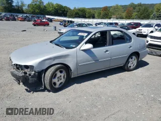 2001 Nissan Altima GXE with VIN 1N4DL01AX1C162935, listed as a Copart auction lot 70843844 with 87,548 mi miles and Salvage Title. Bid and sale history available at carsss.com. Image 1.