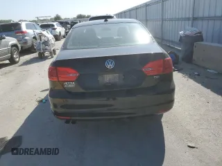 2014 Volkswagen Jetta TDI w/Premium with VIN 3VW3L7AJ2EM392016, listed as a Copart auction lot 69305904 with 111,903 mi miles and Salvage title. Bid and sale history available at DreamBid. Image 6.