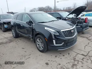 2023 Cadillac XT5 FWD Premium Luxury z VIN 1GYKNCRS2PZ146772, wystawiony jako IAAI lot #41507707 z przebiegiem 47 379 mil mil oraz . Historia ofert i sprzedaży dostępna na DreamBid. Obrazek 1.