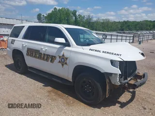 2020 Chevrolet Tahoe Commercial with VIN 1GNLCDECXLR154849, listed as a IAAI auction lot 42050778 with 124,771 mi miles and . Bid and sale history available at DreamBid. Image 1.