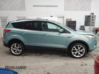 2013 Ford Escape Titanium with VIN 1FMCU9J9XDUC60029, listed as a IAAI auction lot 41936948 with 184,012 mi miles and . Bid and sale history available at DreamBid. Image 13.