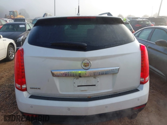 2011 Cadillac SRX Performance Collection with VIN 3GYFNBEY4BS600709, listed as a IAAI auction lot 40858453 with 148,769 mi miles. Bid and sale history available at carsss.com. Image 16.