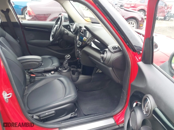 2019 MINI Hardtop 4 Door Cooper with VIN WMWXU1C58K2J02294, listed as a IAAI auction lot 41910654 with 97,887 mi miles. Bid and sale history available at carsss.com. Image 5.