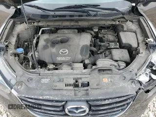 2016 Mazda CX-5 Touring with VIN JM3KE2CY8G0902131, listed as a Copart auction lot 53354745 with 123,474 mi miles and Salvage Title. Bid and sale history available at carsss.com. Image 12.