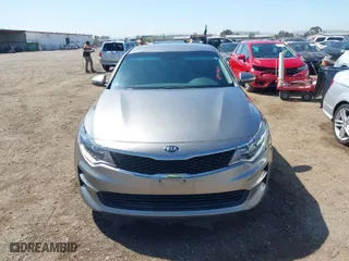 2016 Kia Optima LX with VIN 5XXGT4L39GG116566, listed as a IAAI auction lot 41949407 with 82,679 mi miles. Bid and sale history available at carsss.com. Image 13.