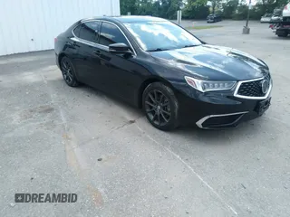 2019 Acura TLX z VIN 19UUB2F38KA004207, wystawiony jako IAAI lot #42394134 z przebiegiem 52 240 mil mil oraz . Historia ofert i sprzedaży dostępna na DreamBid. Obrazek 1.