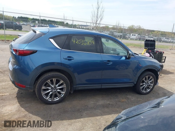 2019 Mazda CX-5 Signature with VIN JM3KFBEY1K0512880, listed as a IAAI auction lot 42036904 with 92,650 mi miles. Bid and sale history available at carsss.com. Image 14.