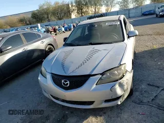 2004 Mazda 3 i with VIN JM1BK12F141168532, listed as a Copart auction lot 43964885 with 266,411 mi miles and Salvage Title. Bid and sale history available at DreamBid. Image 10.
