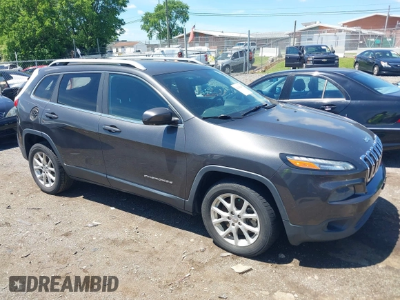 2014 Jeep Cherokee Latitude with VIN 1C4PJLCS0EW297415, listed as a IAAI auction lot 42198645 with 160,268 mi miles. Bid and sale history available at carsss.com. Image 13.