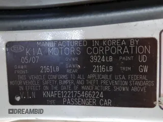 2007 Kia Spectra EX z VIN KNAFE122175466224, wystawiony jako Copart lot #54455405 z przebiegiem 55 616 mil mil oraz Szkody całkowita. Historia ofert i sprzedaży dostępna na DreamBid. Obrazek 12.
