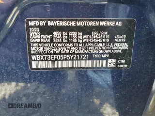 2023 BMW X1 xDrive28i with VIN WBX73EF05P5Y21721, listed as a Copart auction lot 50749295 with 10,633 mi miles and Salvage title. Bid and sale history available at DreamBid. Image 14.