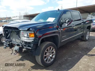 2014 GMC Sierra 1500 Denali z VIN 3GTU2WEC6EG401458, wystawiony jako IAAI lot #41935704 z przebiegiem 149 136 mil mil oraz . Historia ofert i sprzedaży dostępna na DreamBid. Obrazek 2.