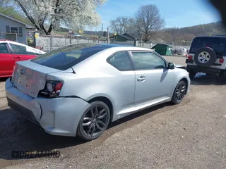 2014 Scion tC with VIN JTKJF5C70E3068144, listed as a IAAI auction lot 41983751 with 137,894 mi miles. Bid and sale history available at carsss.com. Image 4.