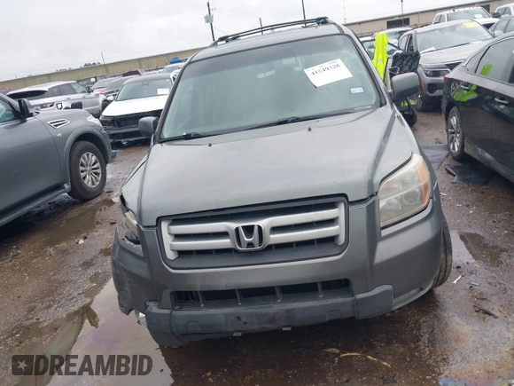 2007 Honda Pilot EX-L with VIN 5FNYF18697B002843, listed as a IAAI auction lot 41549328 with 202,365 mi miles and . Bid and sale history available at DreamBid. Image 12.