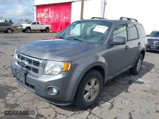 2010 Ford Escape XLT with VIN 1FMCU0D76AKA33885, listed as a IAAI auction lot 41837102 with 140,193 mi miles. Bid and sale history available at carsss.com. Image 2.