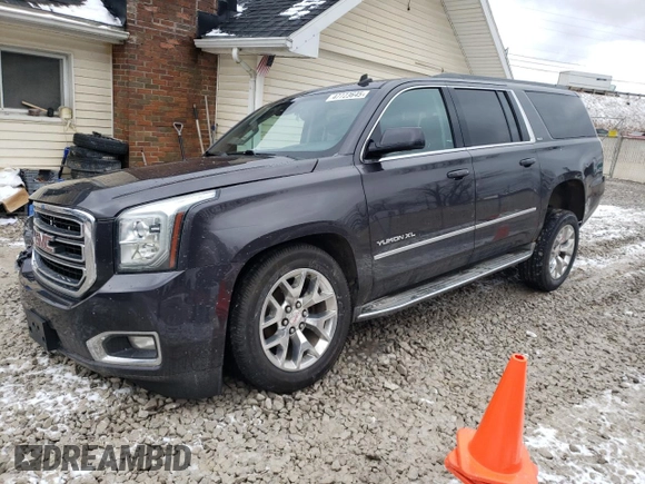 2015 GMC Yukon XL SLT with VIN 1GKS2HKC5FR129143, listed as a Copart auction lot 47723645 with 205,147 mi miles and Salvage Title. Bid and sale history available at carsss.com. Image 1.