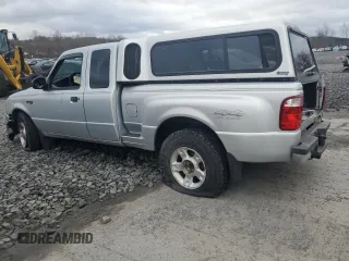 2001 Ford Ranger XL Fleet with VIN 1FTZR15E11TA47318, listed as a Copart auction lot 53272335 with 265,666 mi miles and Salvage title. Bid and sale history available at DreamBid. Image 2.