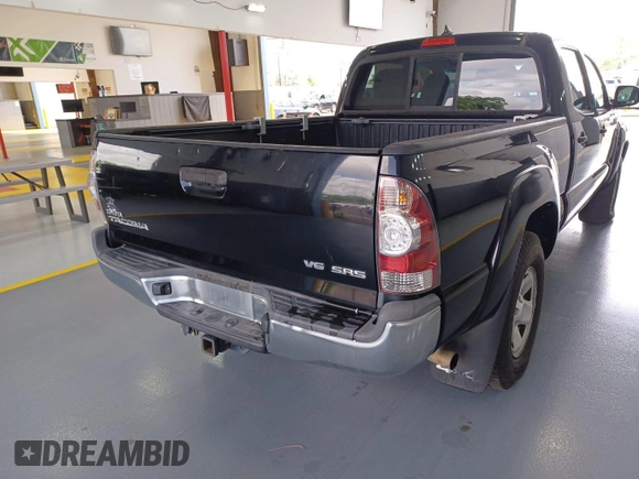 2014 Toyota Tacoma with VIN 3TMMU4FN8EM068633, listed as a IAAI auction lot 42727713 with 185,402 mi miles and . Bid and sale history available at DreamBid. Image 3.