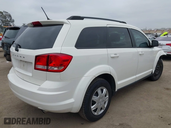 2014 Dodge Journey American Value with VIN 3C4PDCAB8ET141803, listed as a IAAI auction lot 42097292 with 76,339 mi miles and . Bid and sale history available at DreamBid. Image 4.