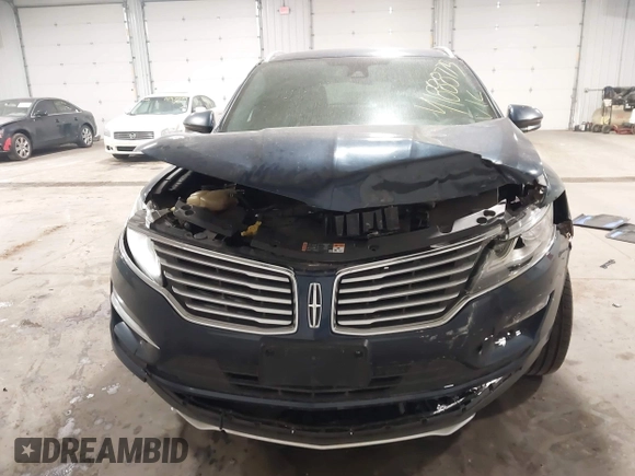 2015 Lincoln MKC with VIN 5LMTJ2AH0FUJ28744, listed as a IAAI auction lot 41888775 with 145,872 mi miles. Bid and sale history available at carsss.com. Image 6.