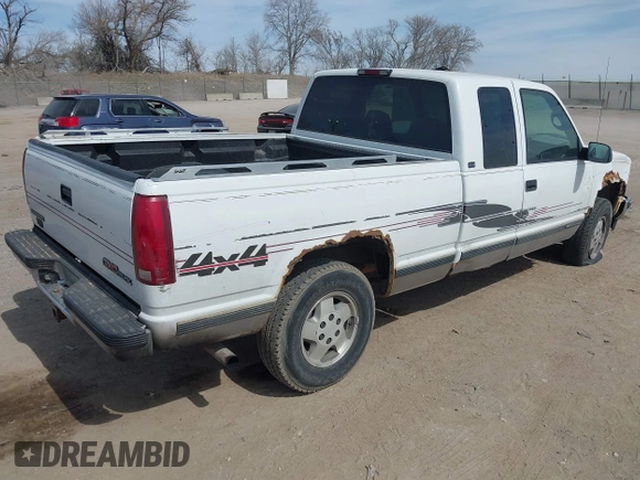 1995 GMC Sierra 1500 z VIN 2GTEK19K0S1580688, wystawiony jako IAAI lot #41811015 z przebiegiem 143 260 mil mil oraz . Historia ofert i sprzedaży dostępna na DreamBid. Obrazek 4.