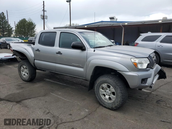 2015 Toyota Tacoma with VIN 3TMLU4EN4FM168078, listed as a Copart auction lot 54689785 with 103,716 mi miles and Salvage Title. Bid and sale history available at DreamBid. Image 4.