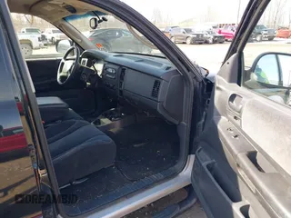 2004 Dodge Dakota SLT with VIN 1D7HG48N54S734087, listed as a IAAI auction lot 41770151 with 129,514 mi miles. Bid and sale history available at carsss.com. Image 5.