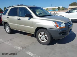 2007 Kia Sportage LX with VIN KNDJE723777448629, listed as a IAAI auction lot 41963572 with 116,700 mi miles. Bid and sale history available at carsss.com. Image 1.