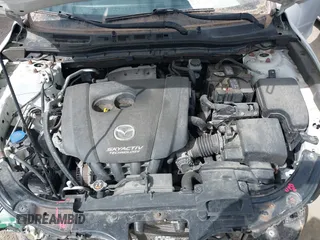 2014 Mazda 3 i Touring with VIN JM1BM1L75E1100432, listed as a IAAI auction lot 41897584 with 149,628 mi miles and . Bid and sale history available at DreamBid. Image 10.