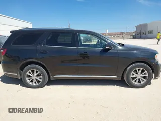 2016 Dodge Durango Limited with VIN 1C4RDHDG9GC360118, listed as a IAAI auction lot 41696388 with 217,550 mi miles. Bid and sale history available at carsss.com. Image 14.