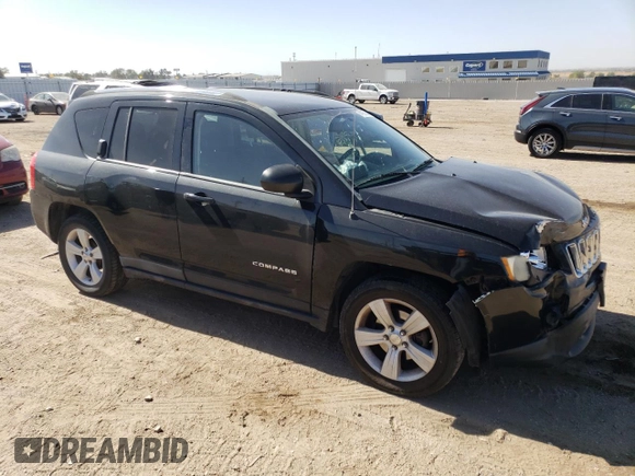 2011 Jeep Compass with VIN 1J4NT1FA4BD159872, listed as a Copart auction lot 74118834 with 142,660 mi miles and Salvage Title. Bid and sale history available at carsss.com. Image 4.