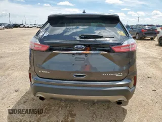 2020 Ford Edge Titanium with VIN 2FMPK3K90LBB37444, listed as a Copart auction lot 60570005 with 118,668 mi miles and Clean title. Bid and sale history available at DreamBid. Image 6.