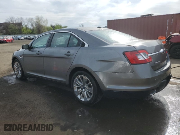 2011 Ford Taurus Limited z VIN 1FAHP2FW0BG179663, wystawiony jako Copart lot #54362415 z przebiegiem 158 449 mil mil oraz Szkoda całkowita • Salvage title. Historia ofert i sprzedaży dostępna na DreamBid. Obrazek 2.