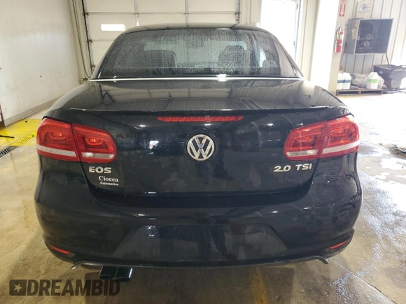 2014 Volkswagen Eos Komfort with VIN WVWBW8AH8EV000316, listed as a Copart auction lot 52208485 with 124,338 mi miles and Salvage Title. Bid and sale history available at DreamBid. Image 6.