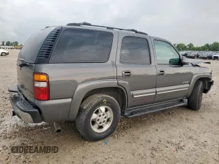 2002 Chevrolet Tahoe LT with VIN 1GNEC13Z22J139029, listed as a Copart auction lot 59149945 with 188,598 mi miles and Salvage title. Bid and sale history available at DreamBid. Image 3.