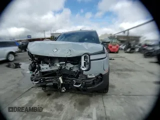 2024 Rivian R1S Adventure with VIN 7PDSGABA7RN038477, listed as a Copart auction lot 48711345 with 0 mi miles and Salvage Title. Bid and sale history available at carsss.com. Image 11.