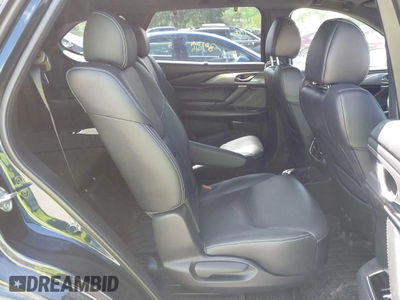 2021 Mazda CX-9 Grand Touring with VIN JM3TCBDY4M0513099, listed as a IAAI auction lot 42563530 with 76,006 mi miles and . Bid and sale history available at DreamBid. Image 8.