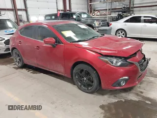 2015 Mazda 3 S Grand Touring with VIN JM1BM1M35F1233107, listed as a IAAI auction lot 41548503 with 141,496 mi miles and . Bid and sale history available at DreamBid. Image 1.