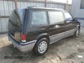 1991 Dodge Caravan z VIN 2B4GK55R6MR136865, wystawiony jako Copart lot #83209824 z przebiegiem 44 931 mil mil oraz Tytuł czysty. Historia ofert i sprzedaży dostępna na DreamBid. Obrazek 3.
