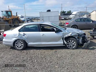 2015 Volkswagen Jetta Sedan 1.8T SE with VIN 3VWD17AJ3FM297573, listed as a IAAI auction lot 41884541 with 98,225 mi miles. Bid and sale history available at carsss.com. Image 13.