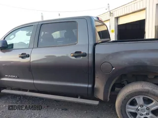 2012 Toyota Tundra 4WD Truck with VIN 5TFDW5F11CX250999, listed as a IAAI auction lot 41087695 with 244,868 mi miles. Bid and sale history available at carsss.com. Image 14.