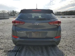 2017 Hyundai Tucson SE with VIN KM8J33A42HU544398, listed as a Copart auction lot 47004675 with 74,561 mi miles and Salvage Title. Bid and sale history available at DreamBid. Image 6.